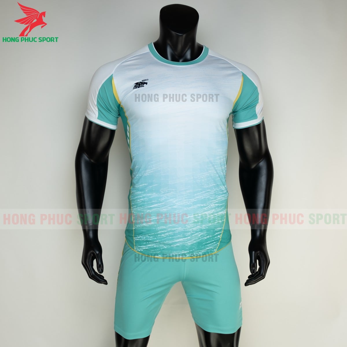 ao-bong-da-khong-logo-Riki-Grambor-mau-Xanh-ngoc-1