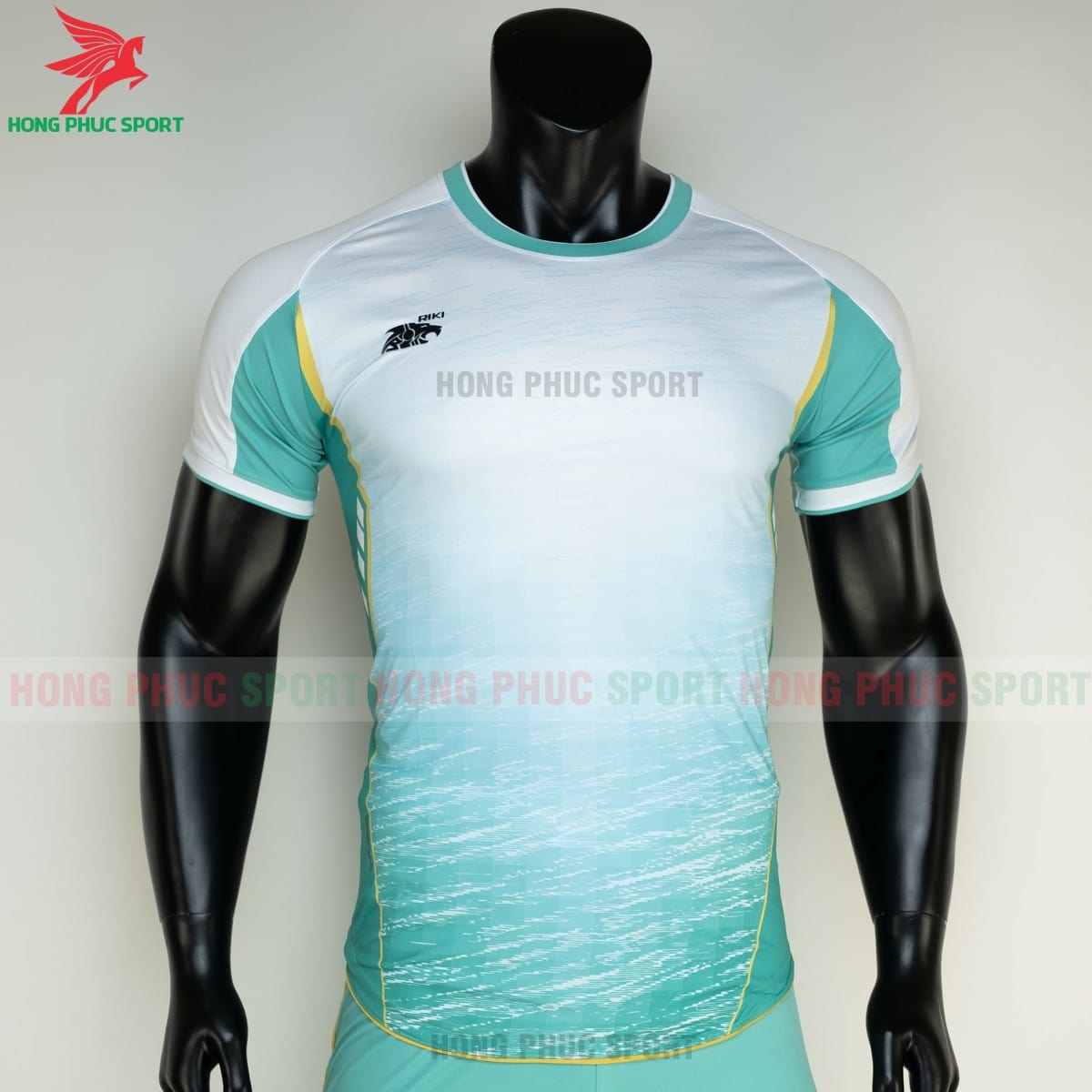 ao-bong-da-khong-logo-Riki-Grambor-mau-Xanh-ngoc-2