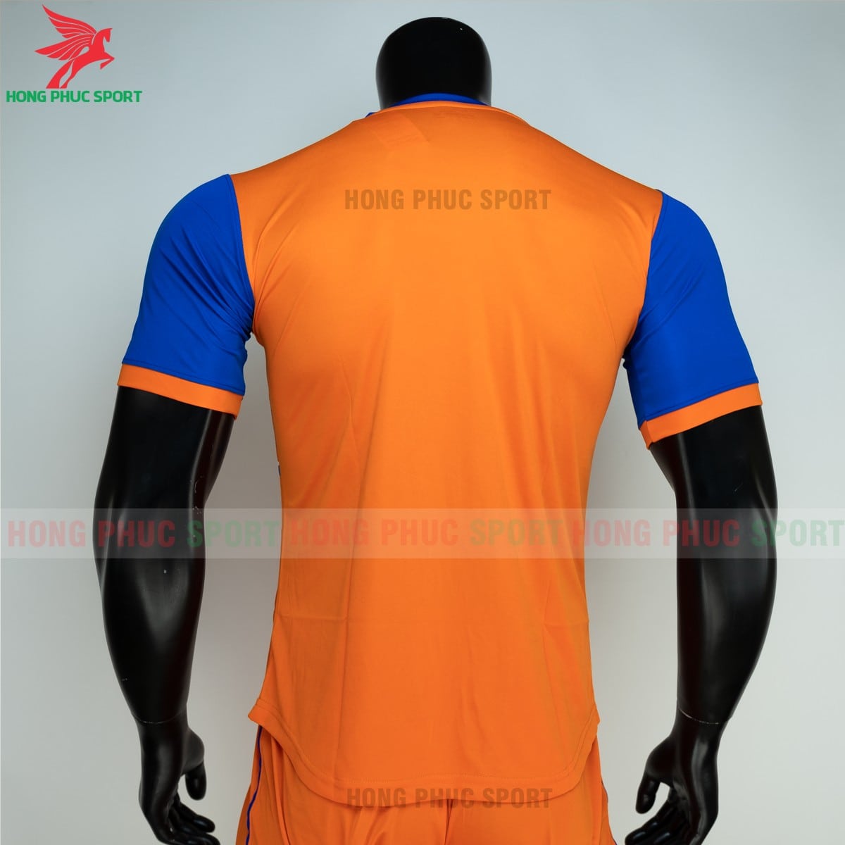 ao-bong-da-khong-logo-Zuka-01-mau-cam-7