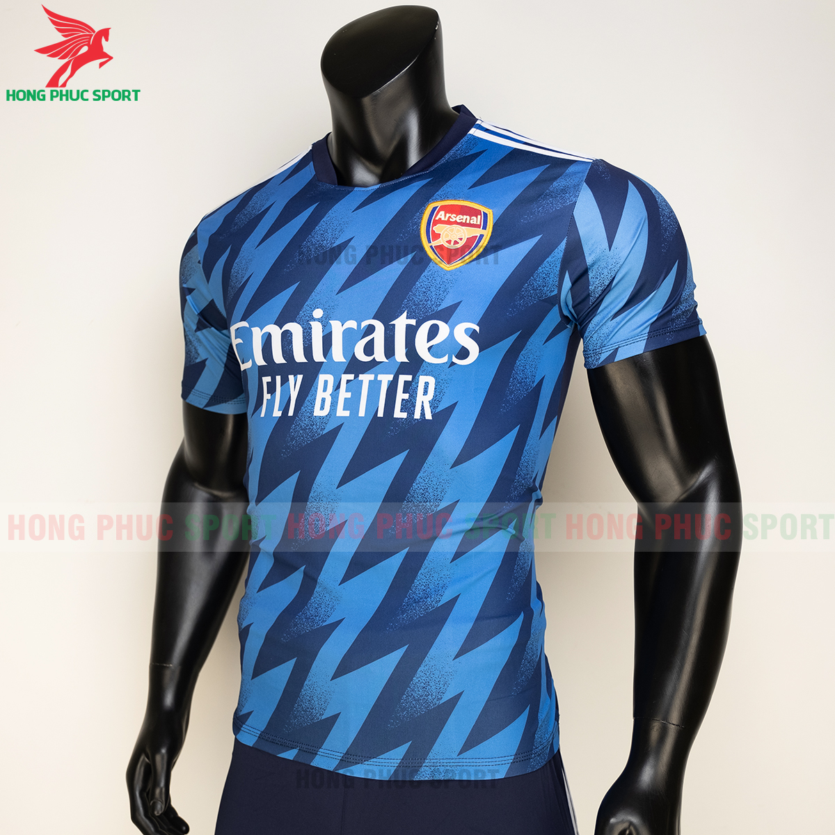 ao-bong-da-arsenal-2021-22-mau-thu-3-thun-lanh-5 ao-bong-da-arsenal-2021-22-mau-thu-3-thun-lanh-5